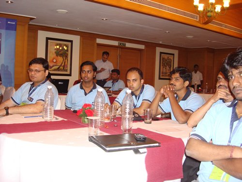 People in a meeting room.